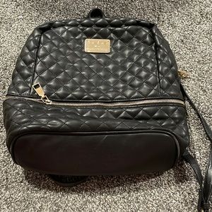 Bebe black and gold backpack